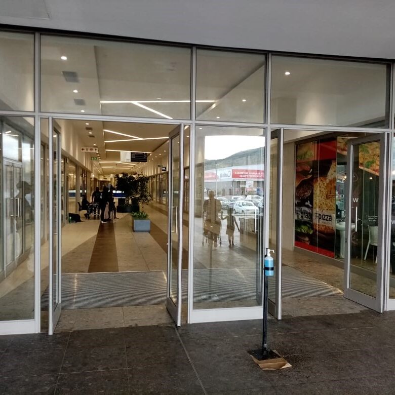 Mall entrances double doors with floorsprings